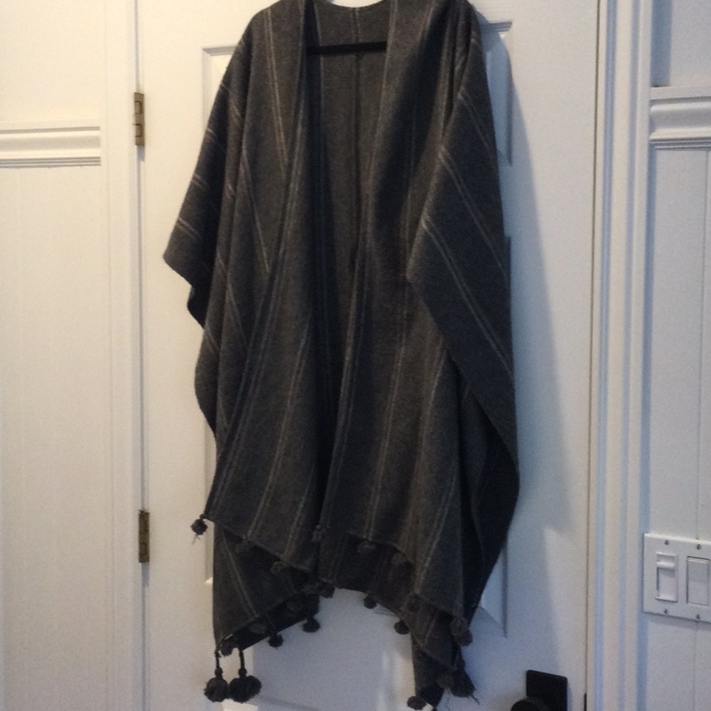 Gray striped open front poncho with tassels